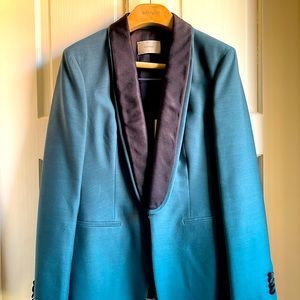 A luxurious and chic wool tuxedo suit.